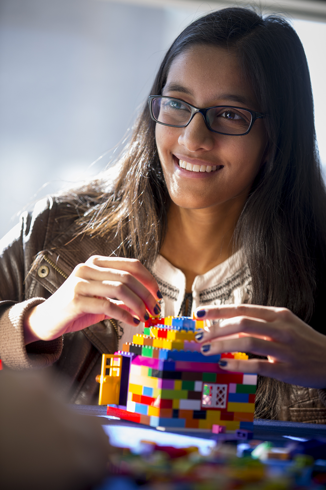 Student with Lego