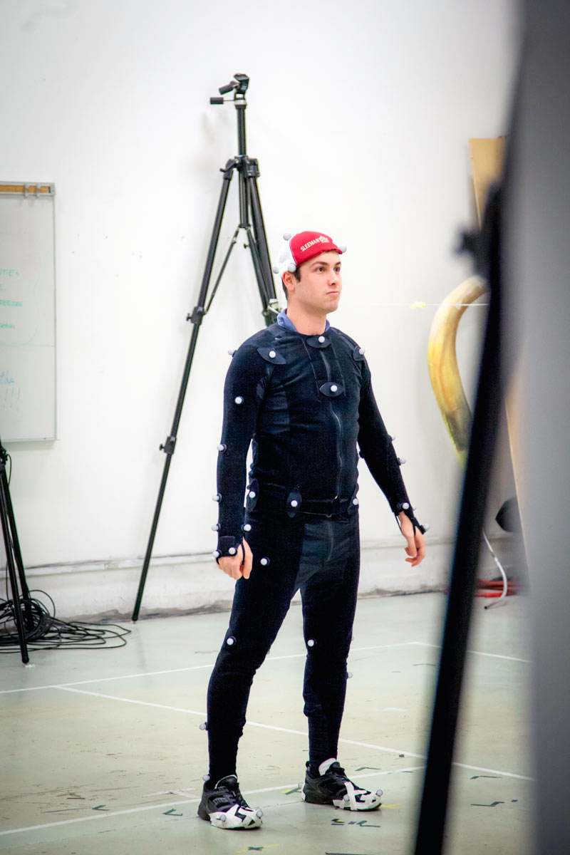 student wearing mocap suit