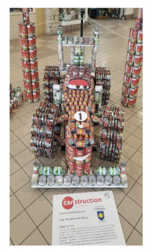 A truck made out of non-perishable canned items for the Canstruction 2024 Competition