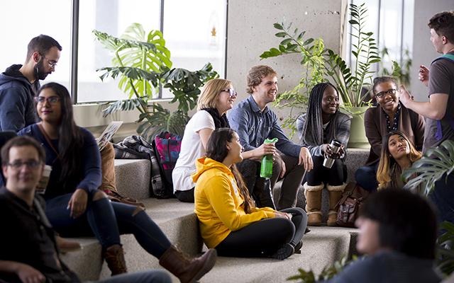 Students sitting in hallway