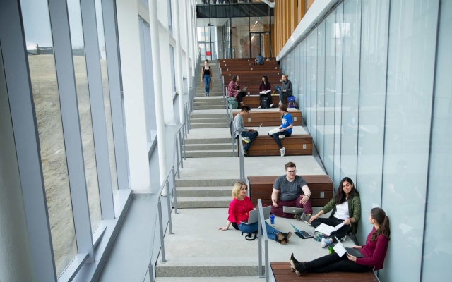 Students sitting on steps