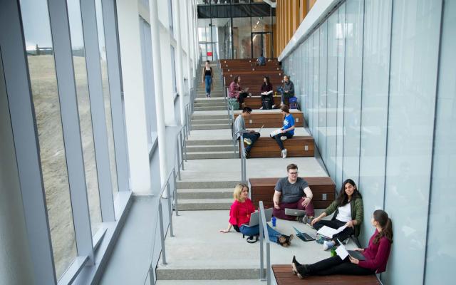 Students sitting on steps