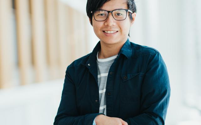 Male student smiling in Winter Garden