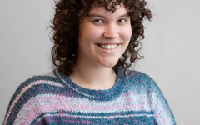 Female student with Curly brown hair 