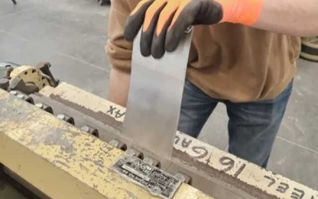 Student using metal bender at U of L
