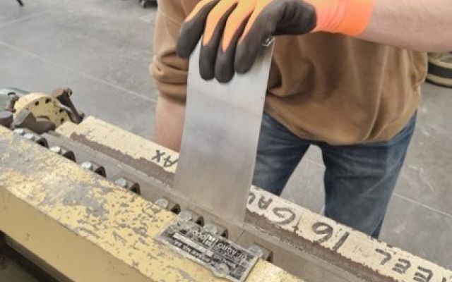 Student using metal bender at U of L