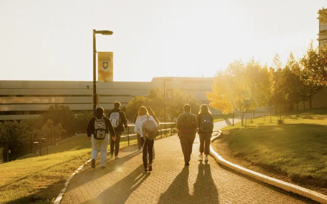 Students walking toward UHall