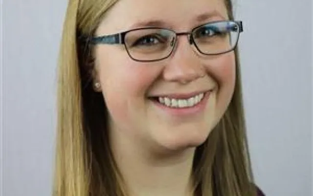 A headshot of Emma Scott.