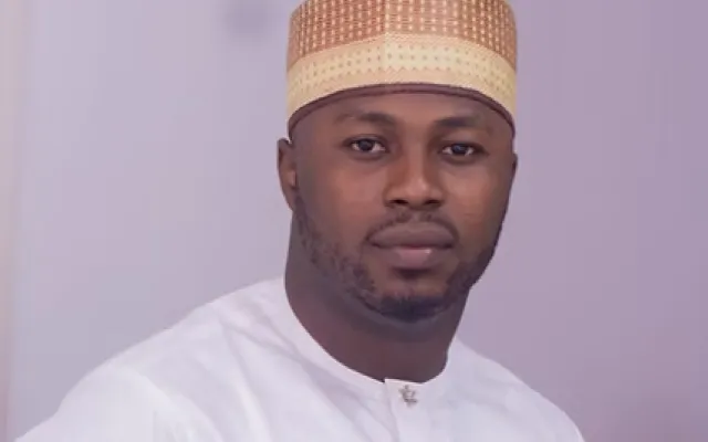 A headshot of Ridwan Tajudeen.