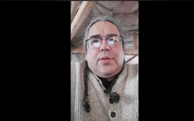 Man outside in warm sweater