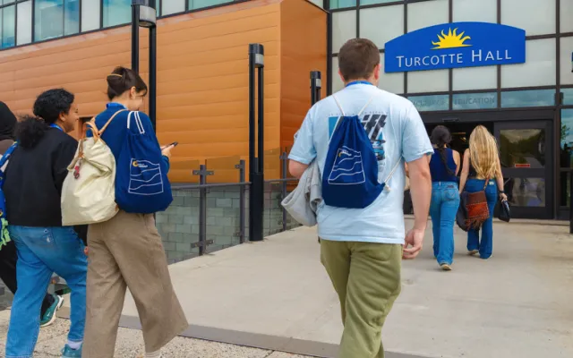 Students enter Turcotte Hall