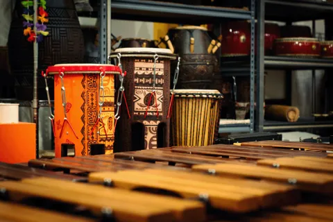 close up of different drums and a xylophone