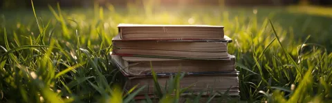 Pile of Books outside in grass