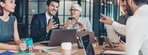 People around a table working
