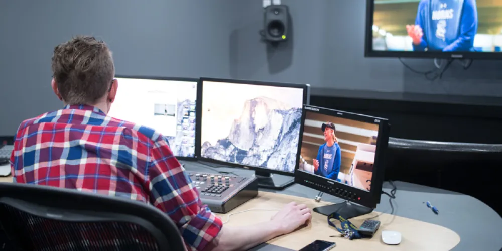 student editing video