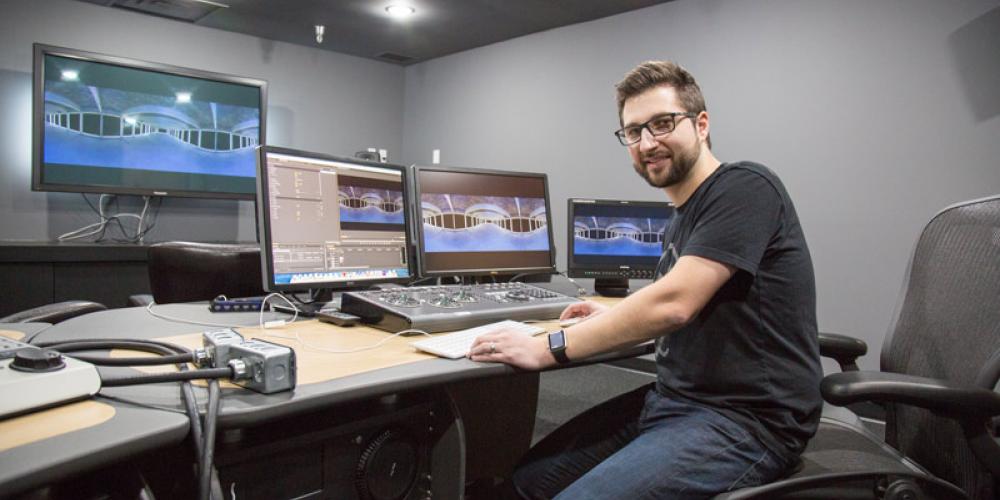 masters student editing virtural reality footage