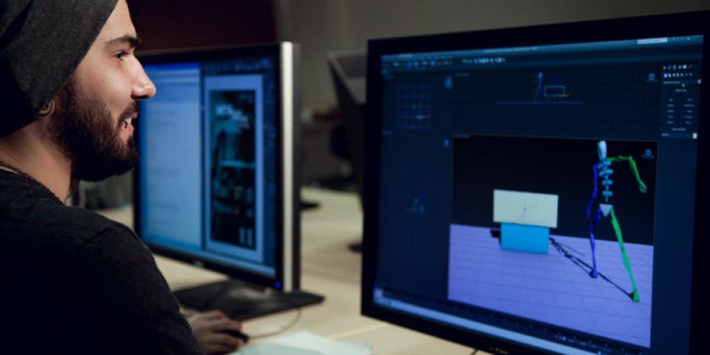 student 3d animating on computer station