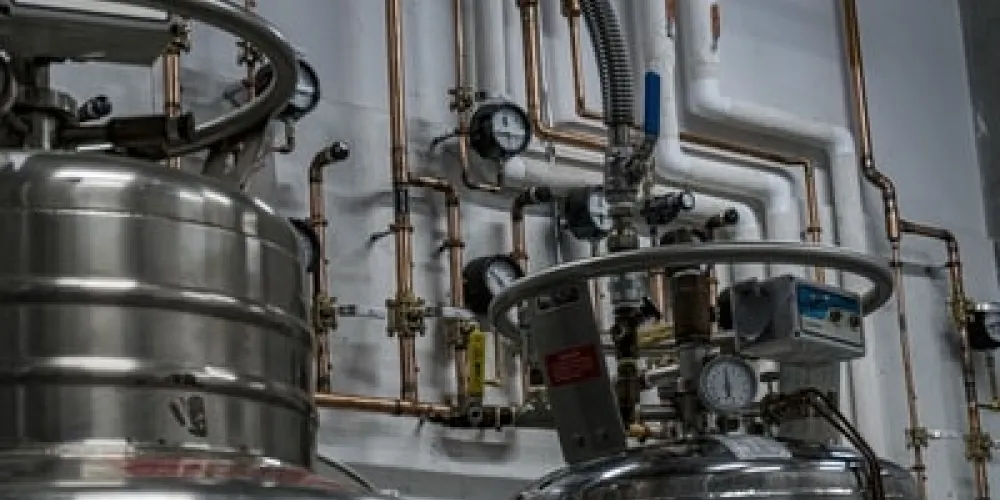 Helium recovery tanks