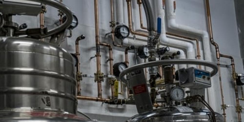 Helium recovery tanks