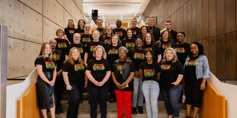 Black History Month 2023 Group Photo wearing BHM T-shirts