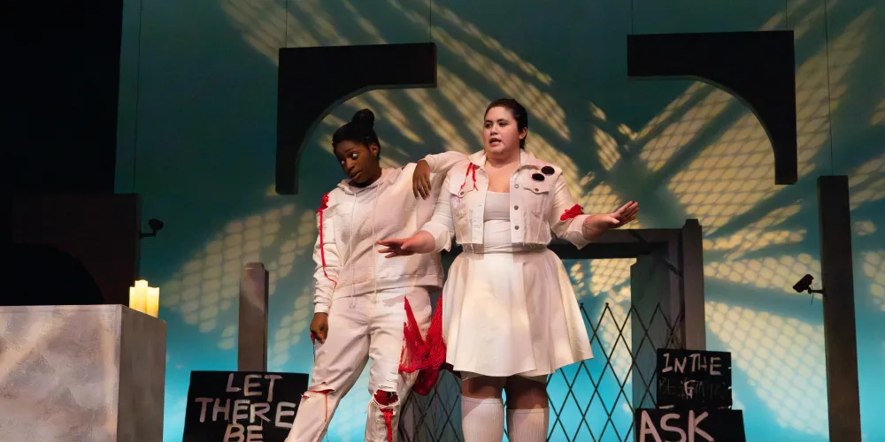 Students in a drama production of Paradise Lost.