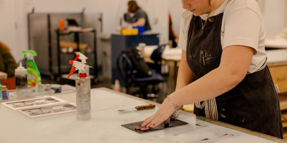 Student in a printmaking art course.