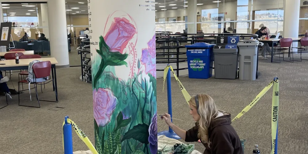 Artist Painting the Mural 