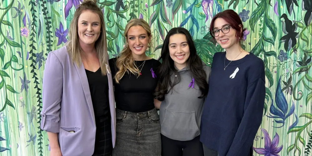 SGBVP Ambassadors infront of the mural 