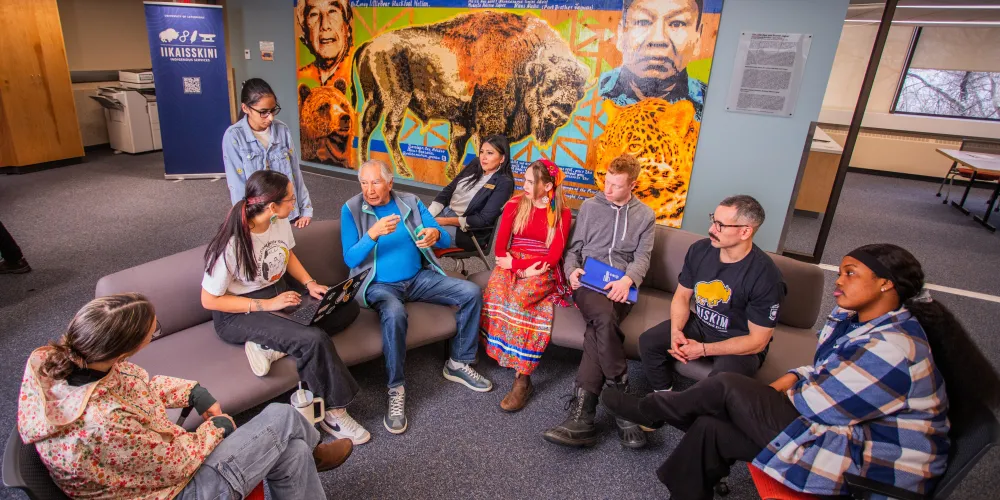 Leroy Little Bear with ULethbridge students
