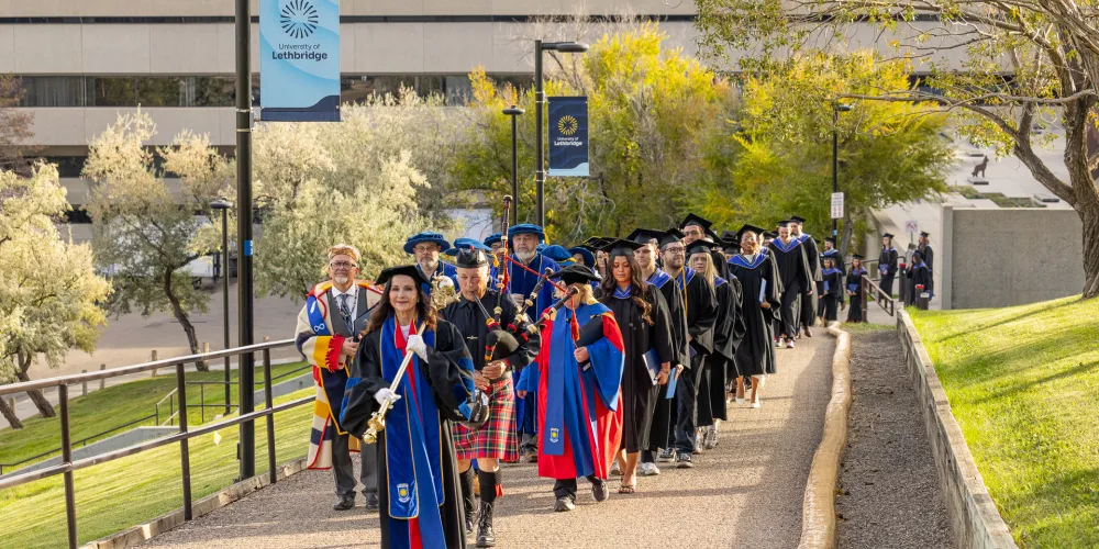 Fall 2026 convocation - march up the hill