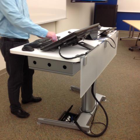Adjustable instructor station