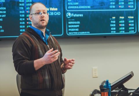 A professor gives a presentation
