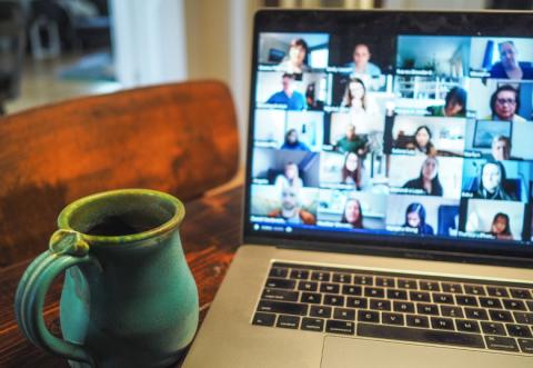 Laptop computer with online group meeting