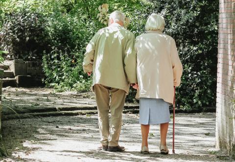 An elderly couple walking An elderly couple walking