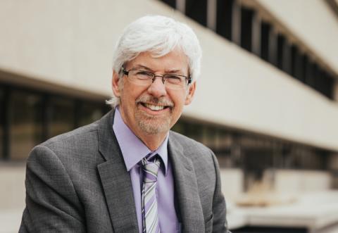 Dr. Trevor Harrison