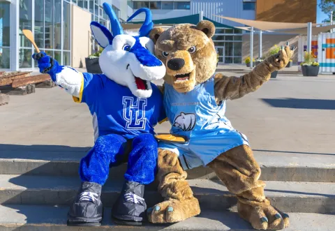 Mascots Luxie, left, and Kodi