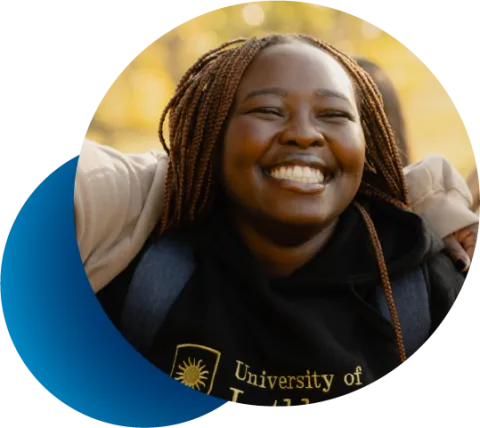 abstact circular frame showing smiling college girl with dark skin enjoying the outdoors