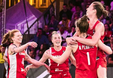 Basketball players celebrate