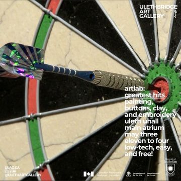 close up of dart board with dart in the centre.