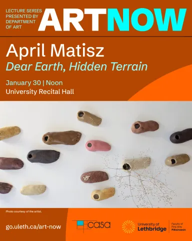 Ceramic foot sculptures in various sizes and colours. A dried twig-like plant is coming out of one of the foot sculptures.