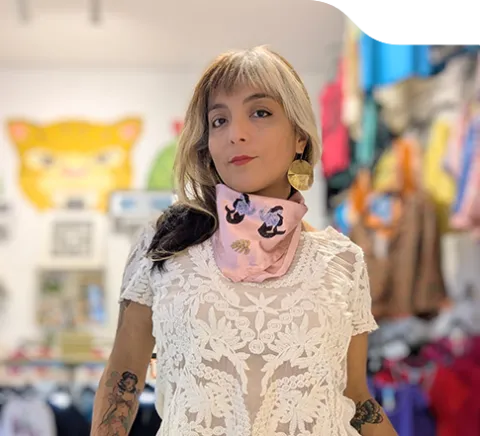 A selfie of Marisol Montiel standing in her shop.