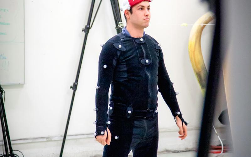 student wearing mocap suit