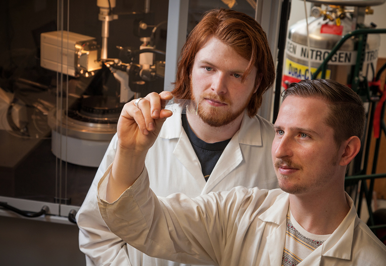 Doug Turnbull, left, and Nathan Kostiuk have taken advantage of the practical learning opportunities provided them by Dr. Michael Gerken.