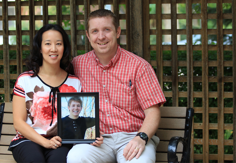 Dr. Wayne and Jasmine Burton, with a photo of their nephew Josh, have established a memorial award in his honour.