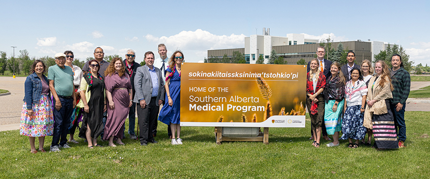 Representatives from SAMP and Iniskim Indigenous Relations gather for a group photo following the ceremony.