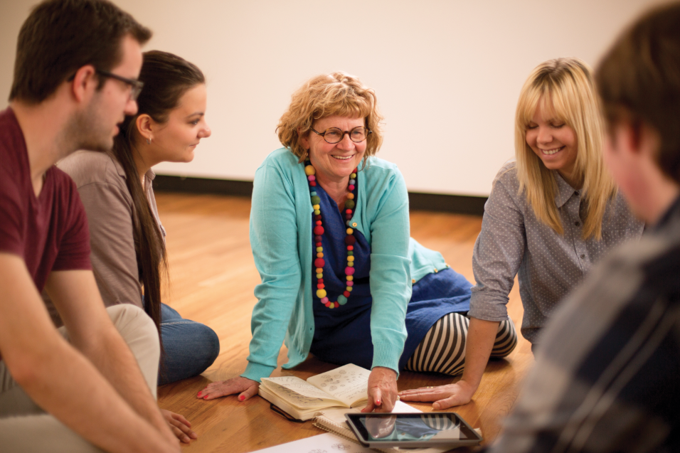 Leanne Elias (L) with a group, including graduate student Christine Clark (R).