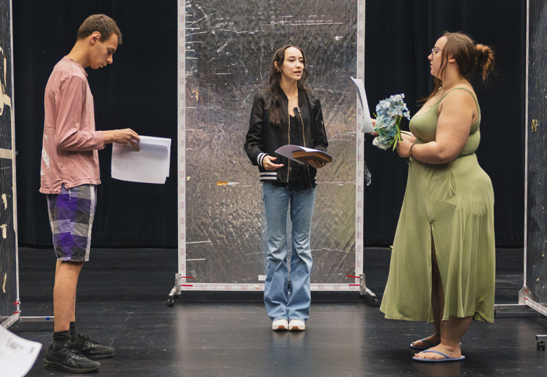 Fine arts students run through a scene that will be viewed by study participants.