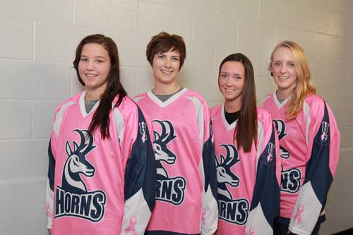 The Horns women's hockey team will be sporting special pink jerseys Oct. 21-22 to help raise awareness of and funds for the fight against breast cancer. Pictured here (L to R) are Breanna Frasca, Megan Bach, Leanne Gerwing and Glenda Edie. Pink in the Rink