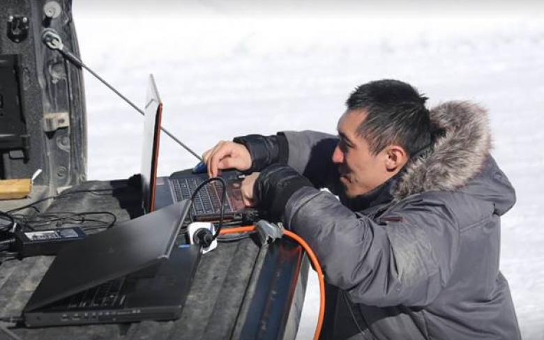 PhD student Zhouxin Xi works on some calculations.