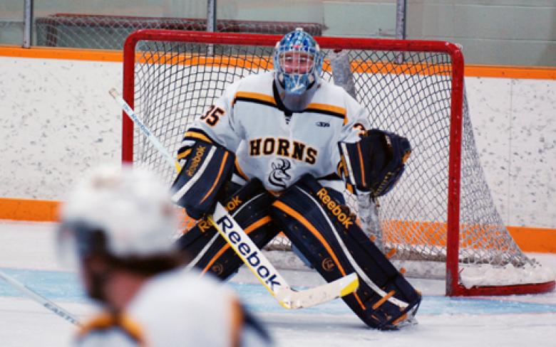 Horns goaltender Dylan Tait readies to take away an offensive opportunity during Canada West play.